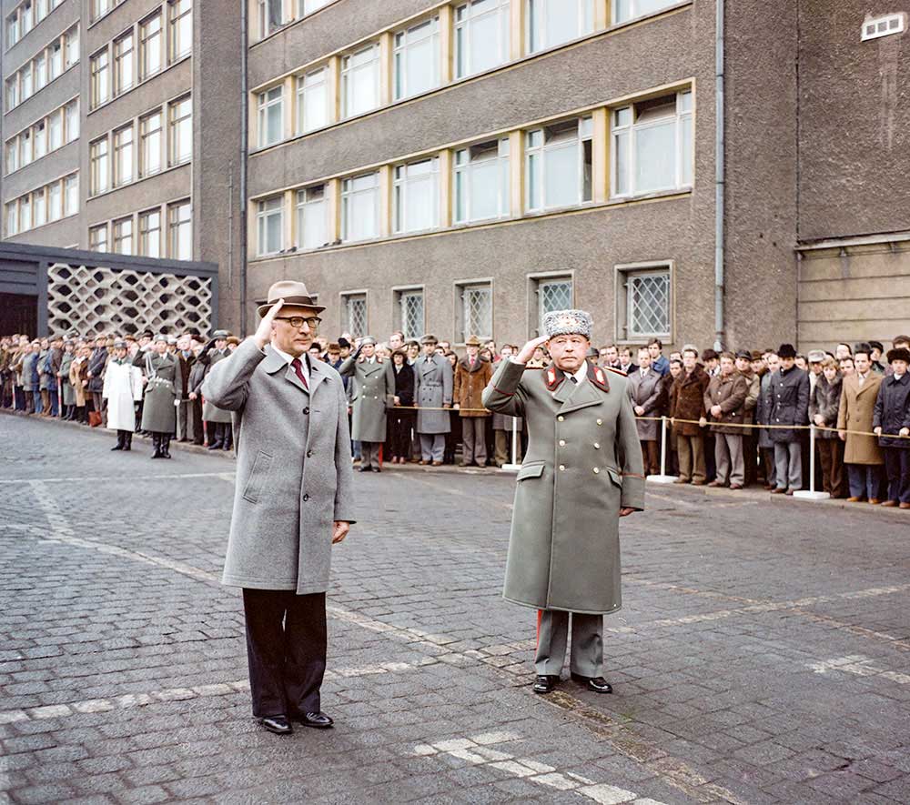 State and party leader Erich Honecker (left) and Erich Mielke (right) salute in front of House 1, February 1980
